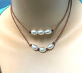 Triple Knotted Oval Pearl Necklace